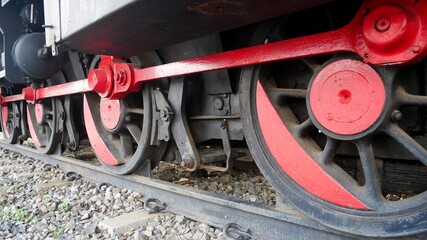 Fototapeta na wymiar close up of repainted old locomotive wheel