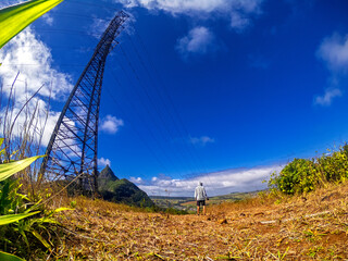 Fototapeta na wymiar View of an electric tower on a mountain ridge located near La Laura, Mauritius
