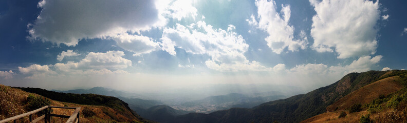 Fototapeta premium Panoramic view of hills and mountains from top of Kew Mae Pan mountain trail located at Doi Inthanon National Park, Chiang Mai, Thailand