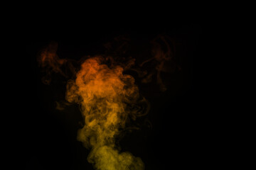 Curly orange yellow steam, Fog or smoke isolated transparent special effect on black background. Abstract mist or smog background, design element for your image, Layout for collages.