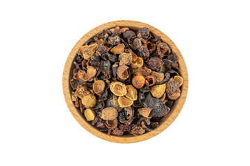 dried rose hip fruit in wooden bowl isolated on white background. Herbs and food ingredients