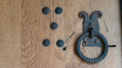 antique door. iron handles on the old door