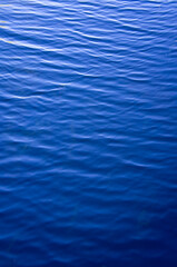 Blue water texture with ripples and waves
