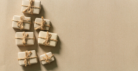 brown gift,Brown christmas gift,Gift boxes wrapped in kraft paper with white, silver and golden...