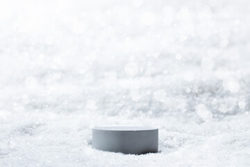 Gray podium with snow background to show cosmetic products. White color minimal backdrop with stand...