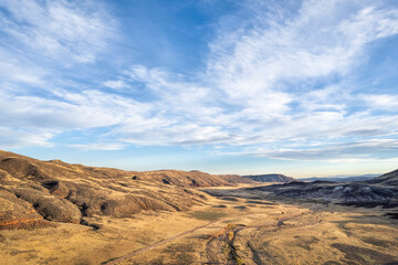 sunset over foothills of Rocky Mountains in northern Colorado, aerial view of fall scenery