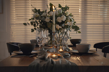 Festive table setting with beautiful tableware and decor indoors