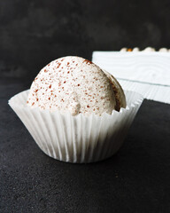chocolate muffin on a white plate
