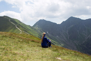 Naklejka premium hiker in the mountains girl woman tatra mountains poland