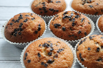 Chocolate chip muffin on white background