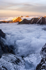 Fototapeta na wymiar Sunset over foggy inversion in High Tatras mountains national park, Slovakia