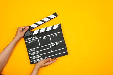 movie clapper a on yellow background
