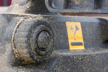 Macro photo of electric saw oil tank