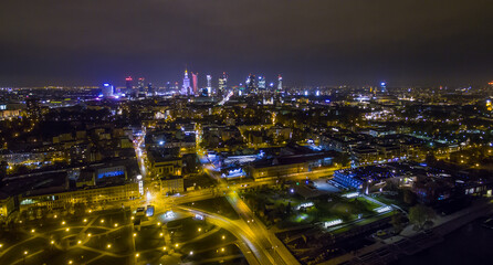 Fototapeta na wymiar Night panorama of Warsaw from above, downtown, photo from the drone, May 2017, Warsaw, Poland.