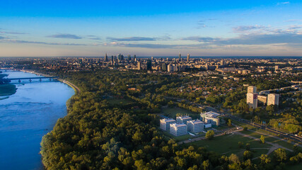 Fototapeta premium Panorama of Warsaw from above, Olympic Center and downtown, photo from the drone, May 2017, Warsaw, Poland.