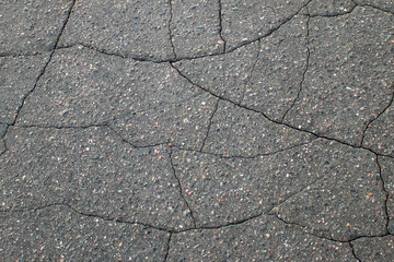 Texture of a broken asphalt