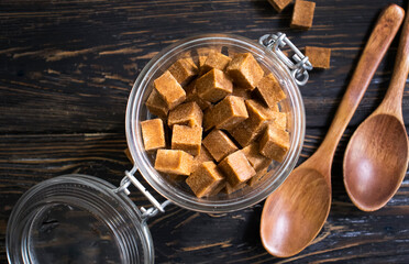brown sugar cubes on a wooden