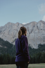 Woman looks a mountain