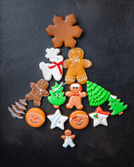 gingerbread on the table in the shape of tree christmas cookies new year ginger cinnamon cake vanilla gingerbread homemade cakes dessert christmas card new year copy space food background rustic