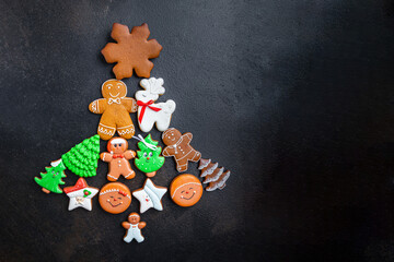 gingerbread on the table in the shape of tree christmas cookies new year ginger cinnamon cake vanilla gingerbread homemade cakes dessert christmas card new year copy space food background rustic