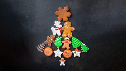 gingerbread on the table in the shape of tree christmas cookies new year ginger cinnamon cake vanilla gingerbread homemade cakes dessert christmas card new year copy space food background rustic