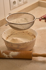 flour sifter to prepare gingerbread man dough