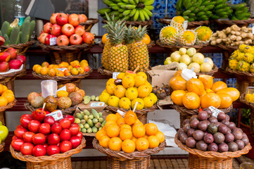 Fototapeta na wymiar Fresh exotic fruits in Mercado Dos Lavradores. Funchal, Madeira, Portugal