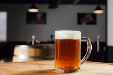 Refreshing glass of craft beer in a pub