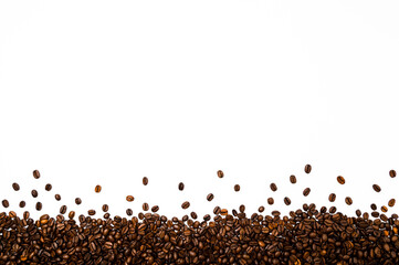 Roasted coffee or espresso beans border or frame against white background. Table top view, flat lay, copy space.