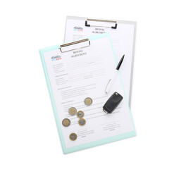Clipboards with rental agreements, money, car key and pen on white background