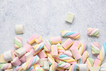 Different yummy marshmallows on light background