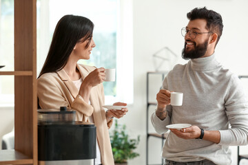 People having coffee break in office