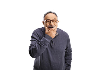 Mature man showing a smiling grimace