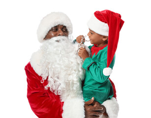Little African-American boy with Santa Claus on white background