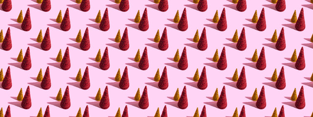 Obraz premium Colored Christmas trees on a pink background. Christmas concept, seamless pattern