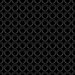 Naklejka premium White double rings on a black background. Vector.