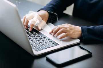 Close up of businesswomen using laptop for access data virtual cloud server, security protection firewall system screen icons on computer network, Technology, and Security internet network concept.