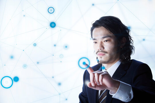 張り巡らせられた点と線の中にいるサラリーマン