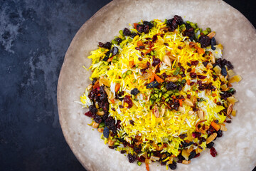 Traditional Persian tahdig jeweled javaher polow bride basmati rice with dried fruits and berries...