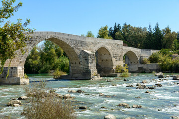Fototapeta premium Seljuk Bridge in Aspendos. Turkey. Aspendos Bridge