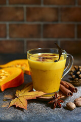 Delicious autumn spicy drink pumpkin latte.