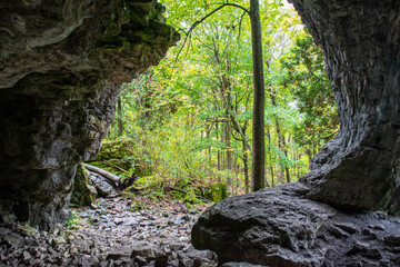 A view from inside of Bruce's Caves near Wiarton, Ontario, looking out towards the surrounding...