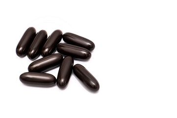 Pills, brown on a white background. Medicine and healthcare.