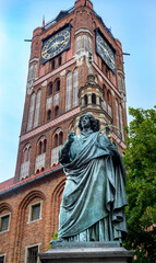 The Nicolaus Copernicus Monument in Torun - home town of astronomer Nicolaus Copernicus. Statue in...