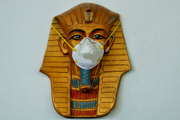 Time Travel vignette. N95 Pandemic Mask on Egyptian Pharaoh bust