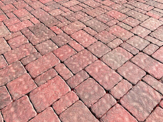 cobblestone diagonal pattern stone block brick walkway sidewalk driveway road transportation background