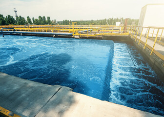 Modern industrial sewage treatment plant, reservoir for sedimentation and purification of waste...