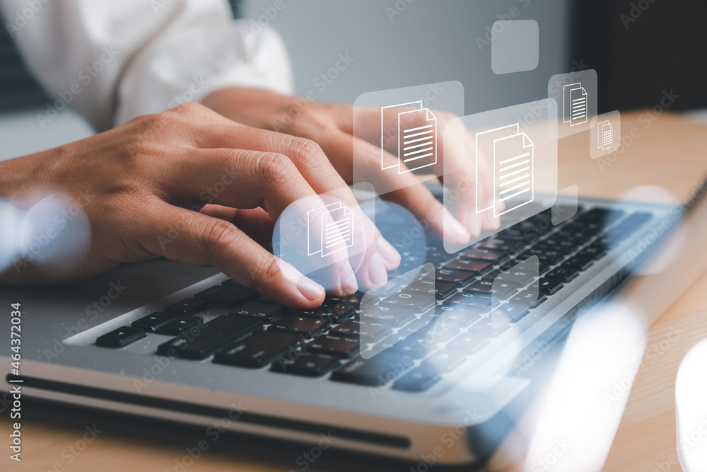 Poster business woman hand using laptop computer with document management icon, document management data sy