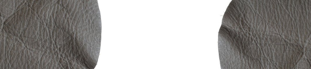  Leather production.Leather banner. Genuine leather pieces in gray tones isolated on white background. material. piece of genuine leather on white background. Raw materials