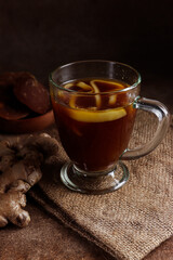 Wedang Bandrek kelapa muda is a traditional drink from West Java, Indonesia, made from ginger, brown sugar, spices and young coconuts. 